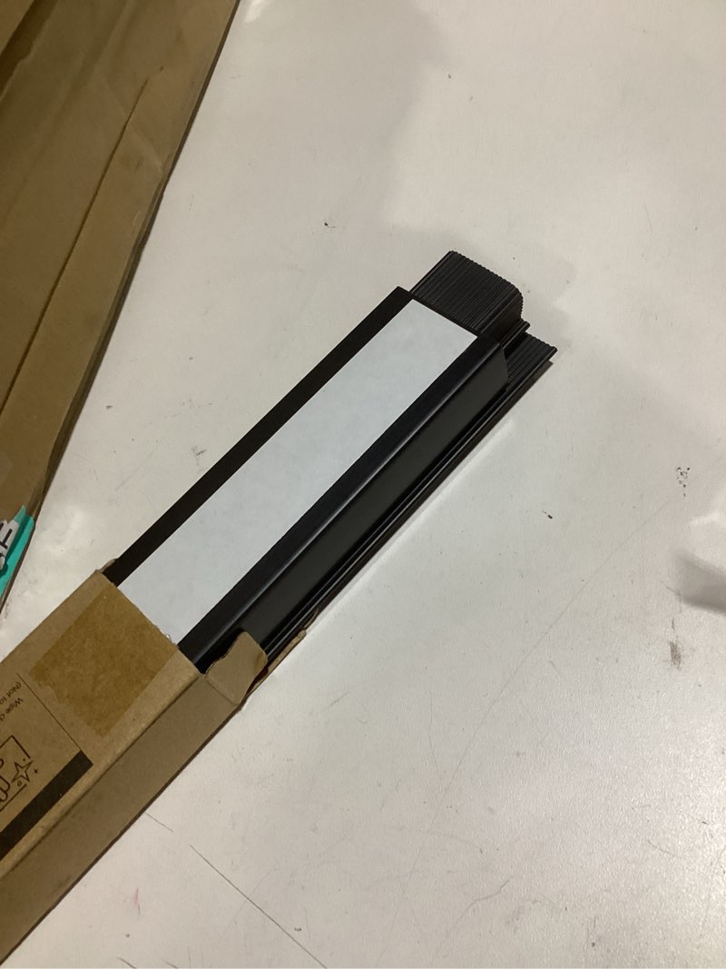 Condition photo showing Good Condition for Delamu 2 Pack Safe & Tidy Cable Management Solution - Protect Kids & Pets with Home & Office Cable Management Under Desk, Cable Organizer, Cable Management Kit, Cord Organizer for Desk, 15.7in x 2 31.4in L*2in W*1in H Black