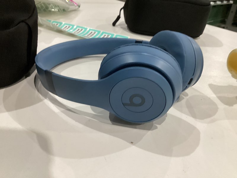 Condition photo showing Good Condition for COMES WITH CHARGER AND CASE. Beats Solo 4 - Wireless On-Ear Bluetooth Headphones, Up to 50-Hour Battery Life, Ultra-Lightweight Comfort, Powerful and Balanced Sound, Apple & Android Compatible - Slate Blue Slate Blue Standalone