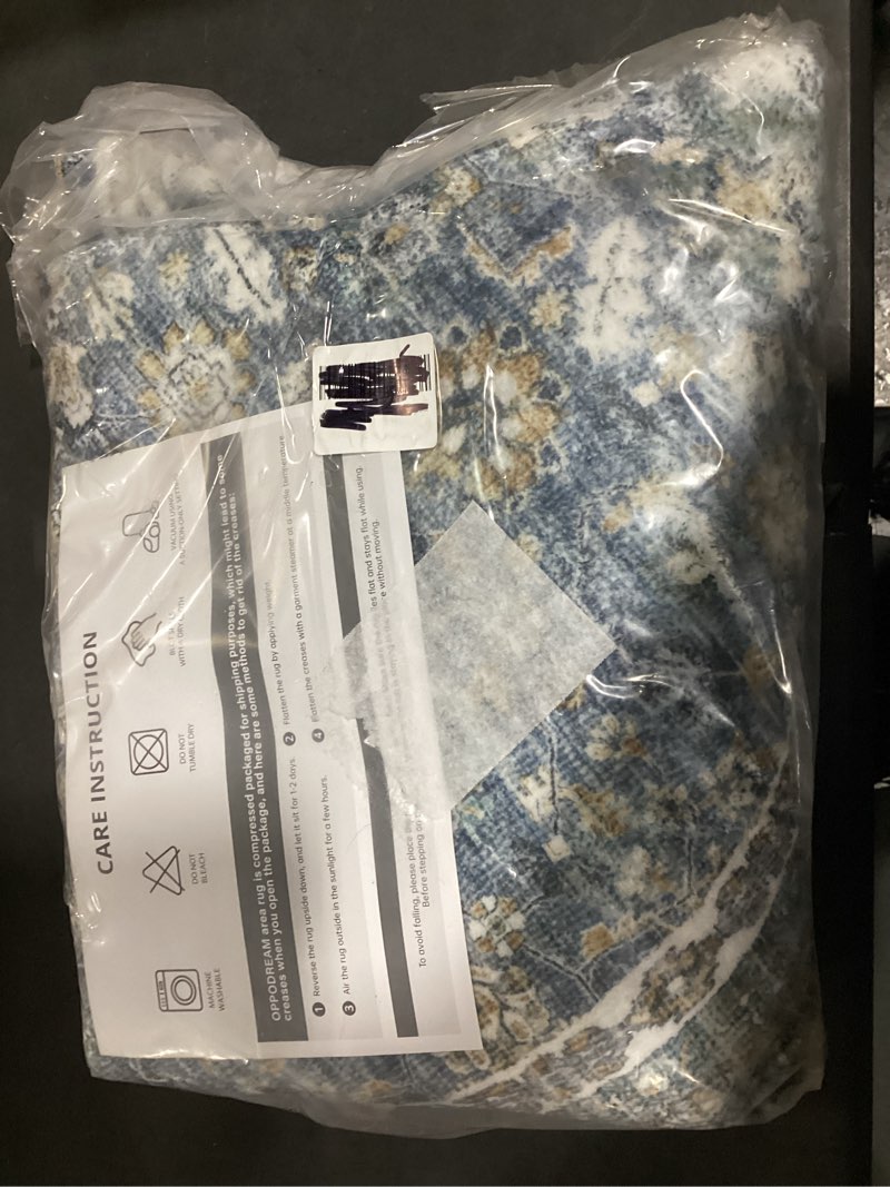 Condition photo showing New/Like New for OPPODREAM Thin Vintage Blue Round Rug 4ft, 4 ft Retro Washable Circle Rug Non Slip, Low-Pile Faux Wool Circular Carpet, Distressed Navy Floor Mat for Living Room, Bedroom, Office, Dorm, Dinning Room Blue Round 4' (Round)