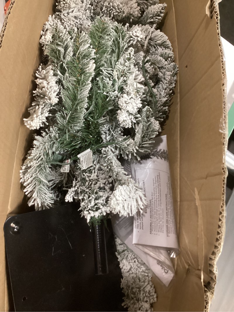 Condition photo showing As Is for Puleo International Pre-Lit 5' Flocked Pencil Alpine Artificial Christmas Tree with 70 Lights 5' Flocked Alpine Fir 70 Clear Lights
