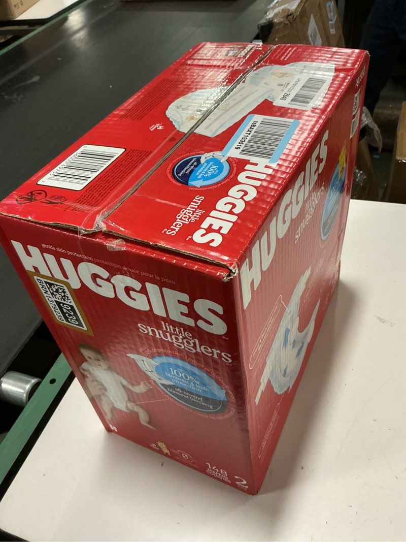 Condition photo showing New/Like New for Huggies Size 2 Diapers, Little Snugglers Baby Diapers, Size 2 (12-18 lbs), 148 Count, Packaging May Vary Size 2 148