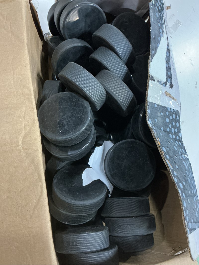Condition photo showing Good Condition for hockey pucks bulk 50 hockey pucks per case official new