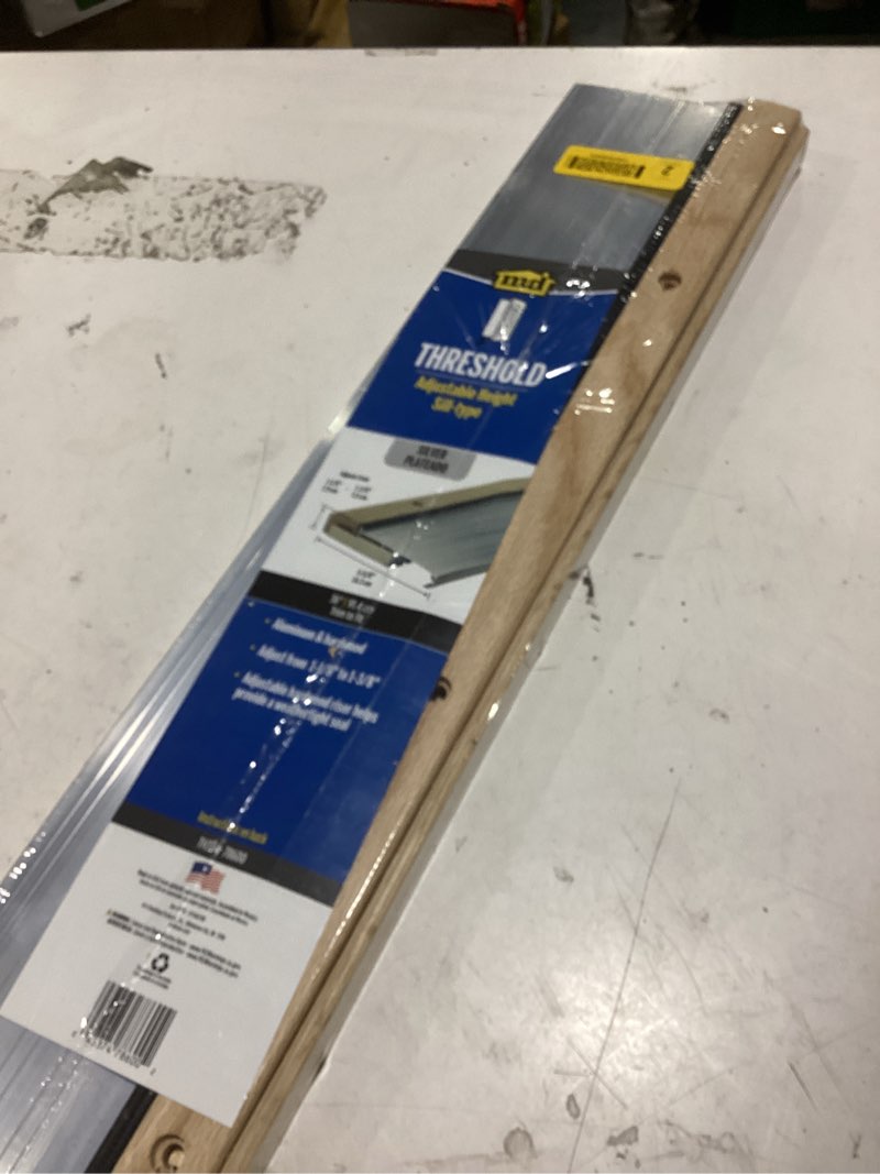 Condition photo showing Good Condition for m-d building products 1.13 in. h x 5.63 in. w x 36 in. l aluminum adjustable threshold oak