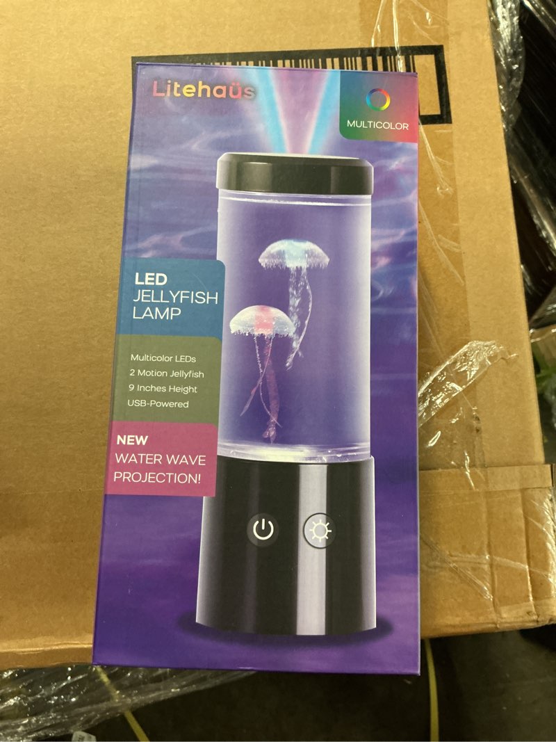 Condition photo showing New/Like New for 9 in. black indoor jellyfish table lamp with rgb led