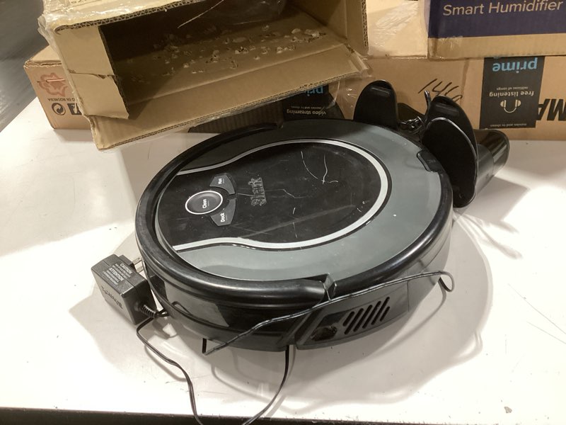 Condition photo showing As Is for Shark AV753 ION Robot Vacuum, Tri-Brush System, Wifi Connected, 120 Min Runtime, Works with Alexa, Multi Surface Cleaning, Grey