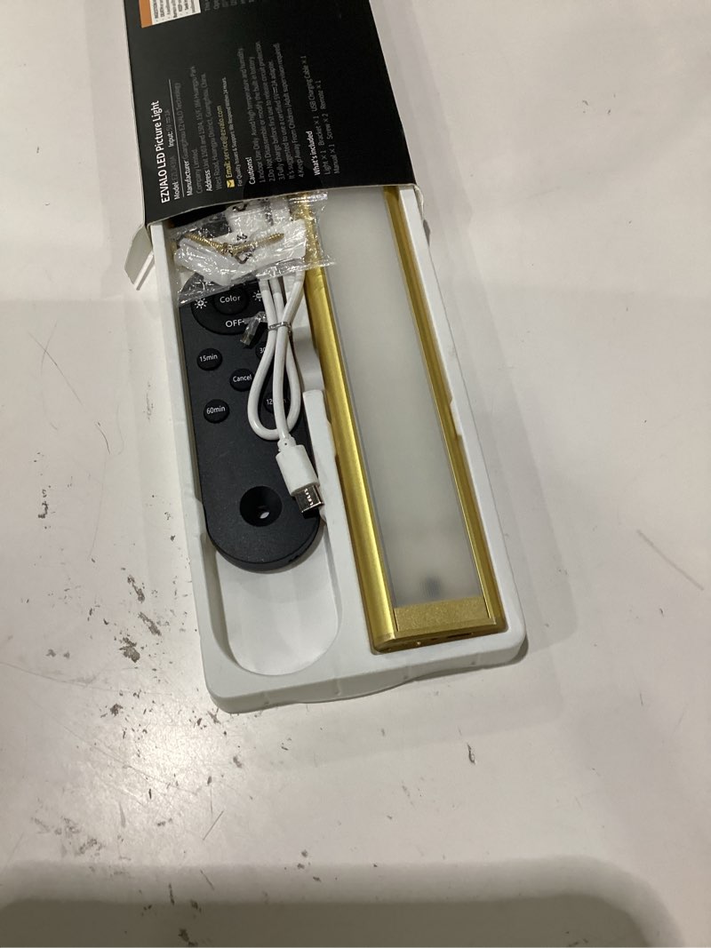 Condition photo showing As Is for ezvalo picture light for wall, 4800mah rechargeable wireless remote, 16in dimmable magnetic led art display light with 3 color temperatures, for gallery, living room, bedroom, hallway (gold) gold 16inch 1