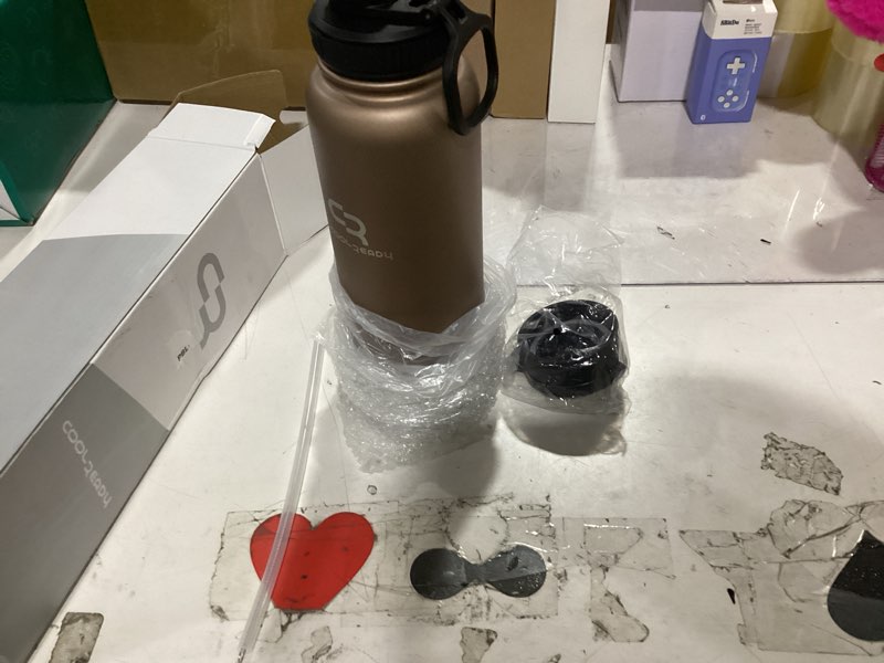 Condition photo showing New/Like New for 40 oz gold insulated water bottle – leak-proof wide mouth stainless steel flask with straw & spout lid + silicone boot – bottle for gym, workout, outdoor use 40 ounces gold