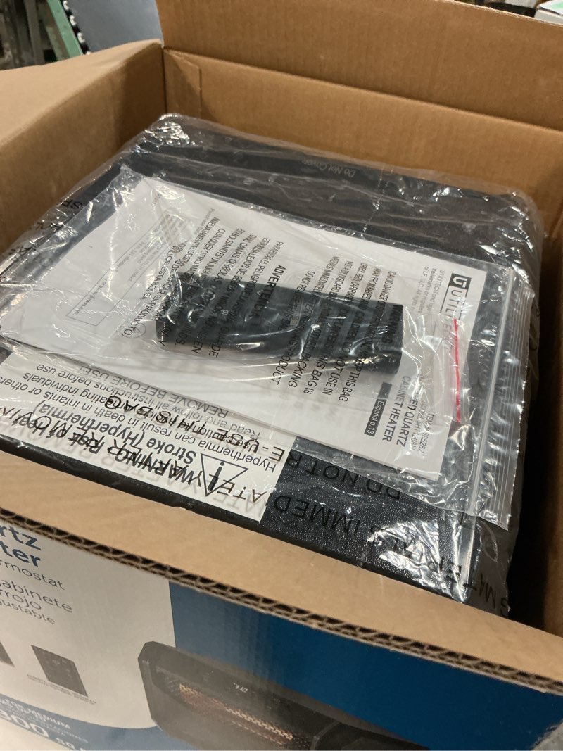 Condition photo showing As Is for Utilitech Electric Space Heater