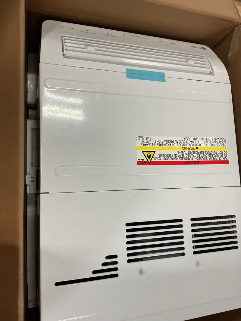 Condition photo showing As Is for ge clearview medium room window air conditioner , remote included ( 115-volt , 8300-btu )