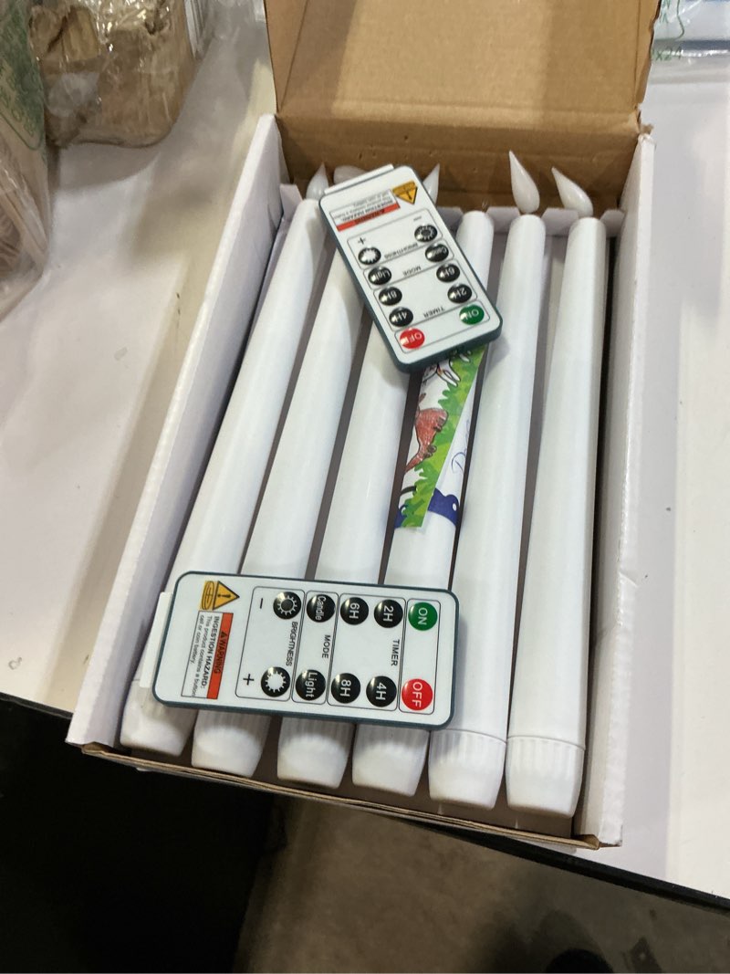 Condition photo showing Good Condition for 12 Pcs Flameless Taper Candles with Remote and Timer, 9.6 Inches Plastic LED Candlesticks, White Battery Operated Window Candles, for Home Wedding Christmas Party Decoration White 12pcs