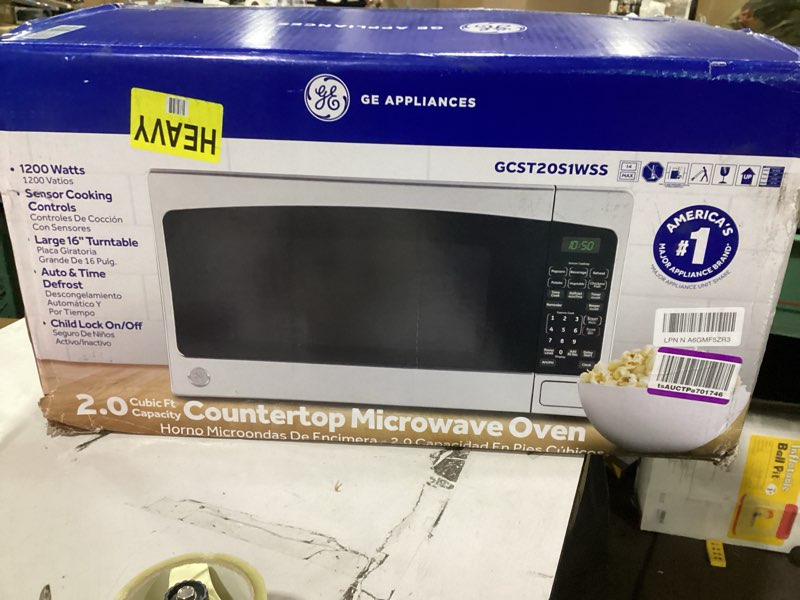 Condition photo showing New/Like New for ge countertop microwave oven,1, 200-watt capacity, 2.0 cubic ft., 8 auto setting cooking settings, child-lock technology, kitchen essentials for the countertop, dorm room or apartment, stainless steel 2.0 cu.ft. stainless steel