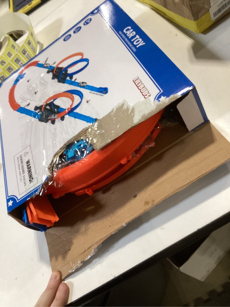 Condition photo showing Good Condition for lilybuds toy car track gift set for boys kids age 3-5 4-7 8-12, long race tracks with 4 action loops and 4 high-speed slot die-cast race cars, 35+ pieces race tracks to create multiple configurations 3322