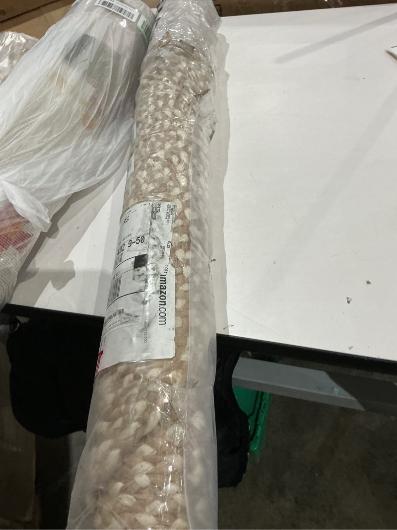 Condition photo showing Good Condition for safavieh area rug 3' round - natural fiber collection - ivory, handmade jute, boho farmhouse braided design (nf364b) 3' (round) ivory