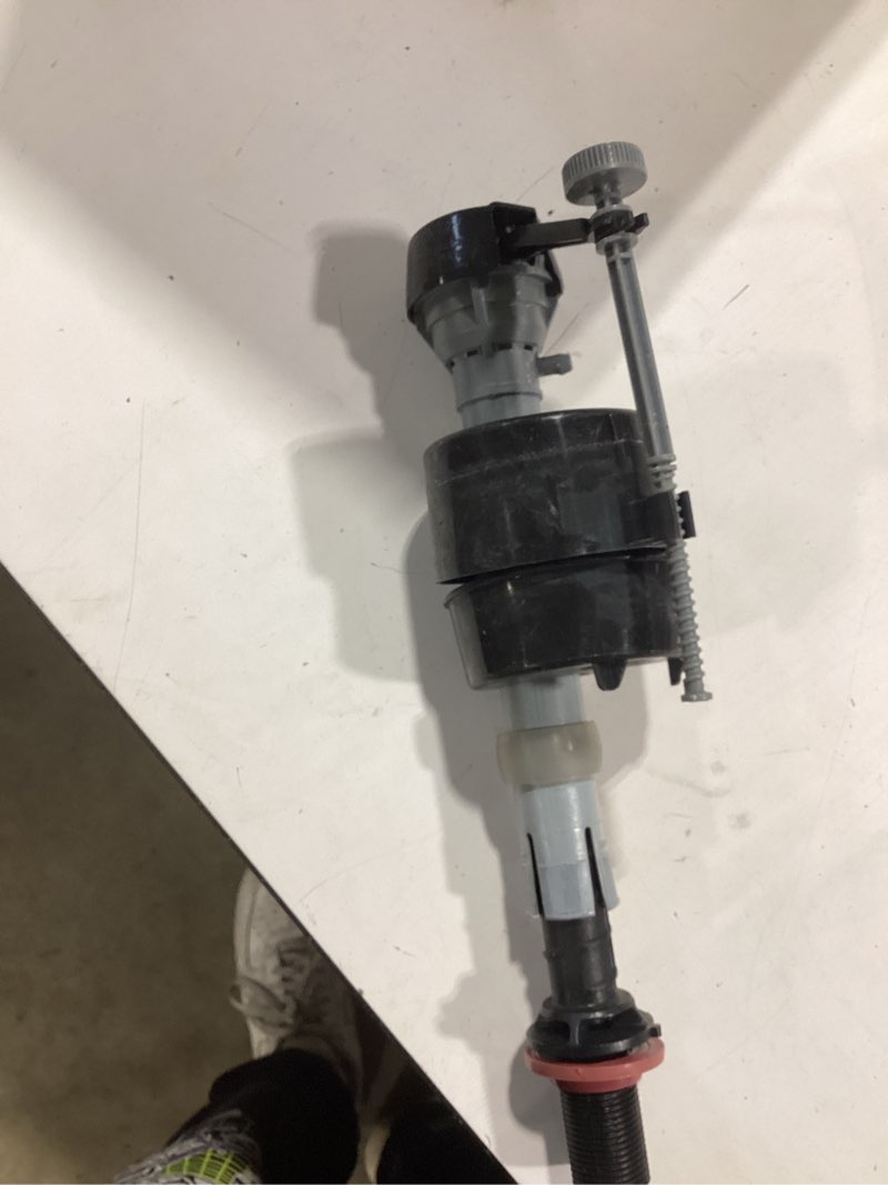 Condition photo showing As Is for ez-flo 3-in universal adjustable toilet fill valve similar item