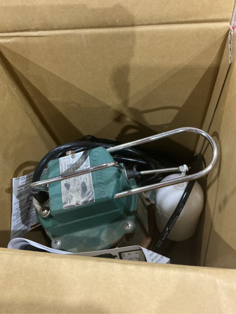 Condition photo showing As Is for zoeller 1/3 hp 2880 gph cast iron vertical float switch ac submersible sump pump