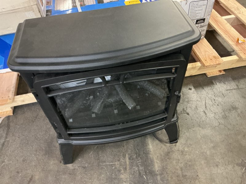 Condition photo showing As Is for Style Selections 25.9-in W 5200 -BTU Black Metal Corner or flat wall Infrared quartz Electric Stove