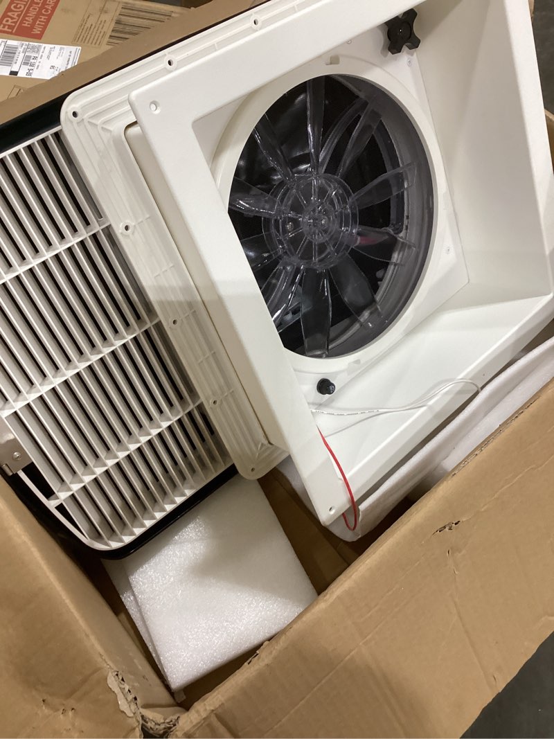 Condition photo showing As Is for roof vent fan reversible