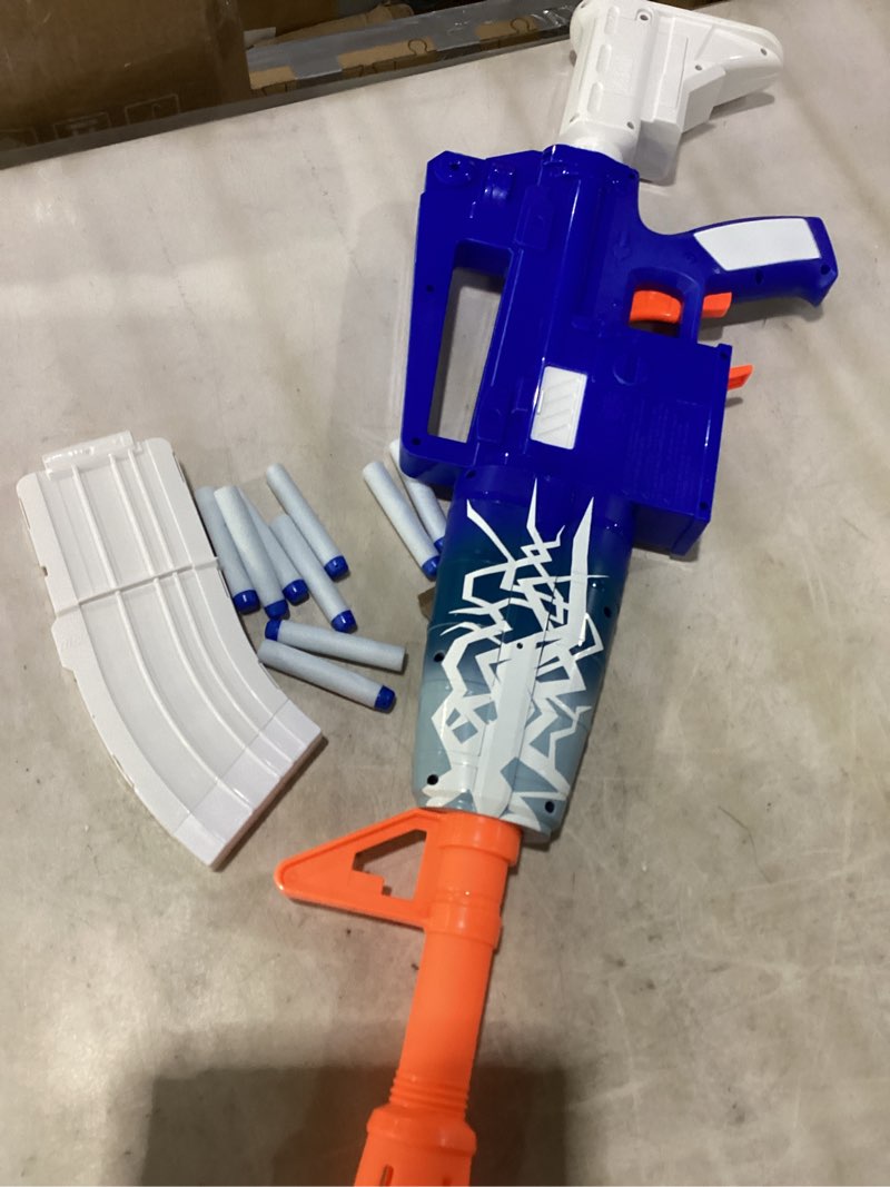 Condition photo showing Good Condition for nerf fortnite blue shock blaster, 10-dart clip, 10 elite nerf darts, includes bonus code to unlock the beat wrap in the game, motorized dart blaster