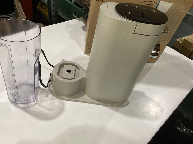 Condition photo showing As Is for ninja pods & grounds single-serve coffee maker, k-cup pod compatible, brews grounds, compact design, 56-oz. reservoir, 6-oz. cup to 24-oz. travel mug brew sizes, iced coffee maker, stone, pb041st, not tested, incomplete