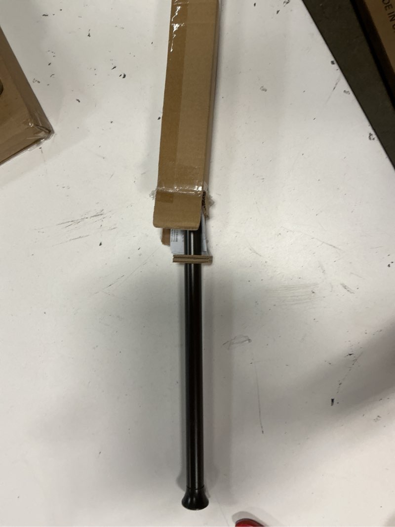 Condition photo showing New/Like New for amazon basics no drill, non slip tension curtain rod, adjustable length 24-36", classic finial, bronze bronze 24-36" indoor