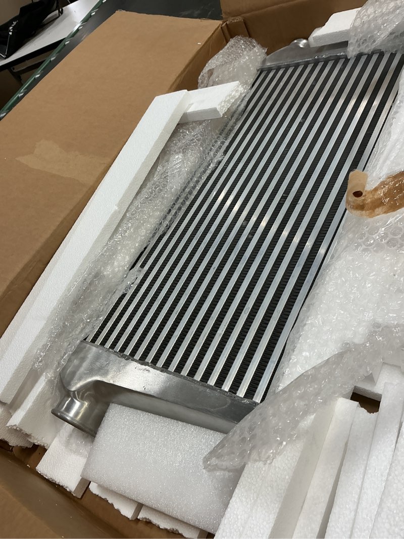 Condition photo showing As Is for universal intercooler, 31''x12''x3" front mount intercooler 2.5'' inlet & outlet universal aluminum turbo intercooler with for turbo charger system (31''x12''x3" 2.5")