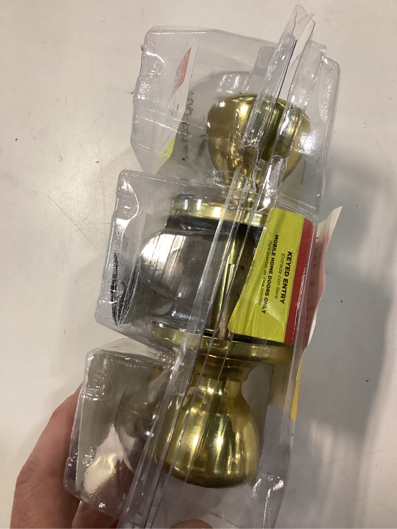 Condition photo showing As Is for kwikset mobile home polished brass entry knobs ansi/bhma grade 3 1-3/4