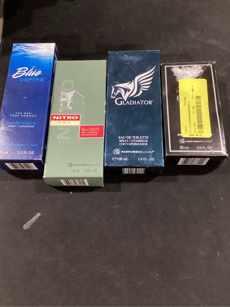 Condition photo showing Good Condition for (qty 4) miscellaneous men’s fragrances 