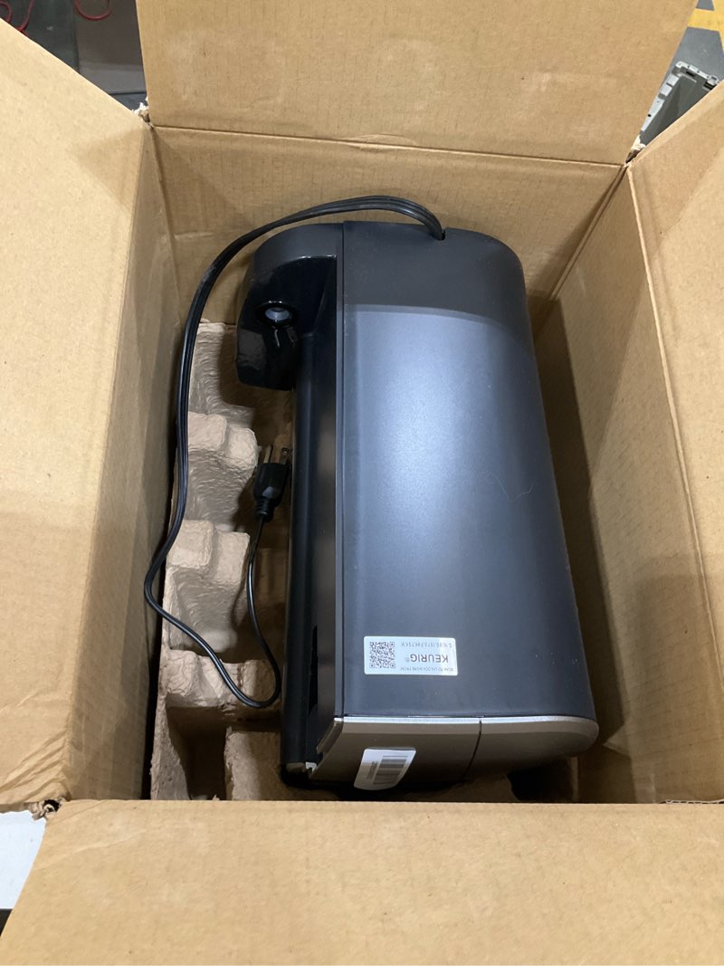 Condition photo showing As Is for incomplete, keurig k-elite single serve k-cup pod coffee maker, with strength and temperature control, iced coffee capability, 8 to 12oz brew size, programmable, brushed silver