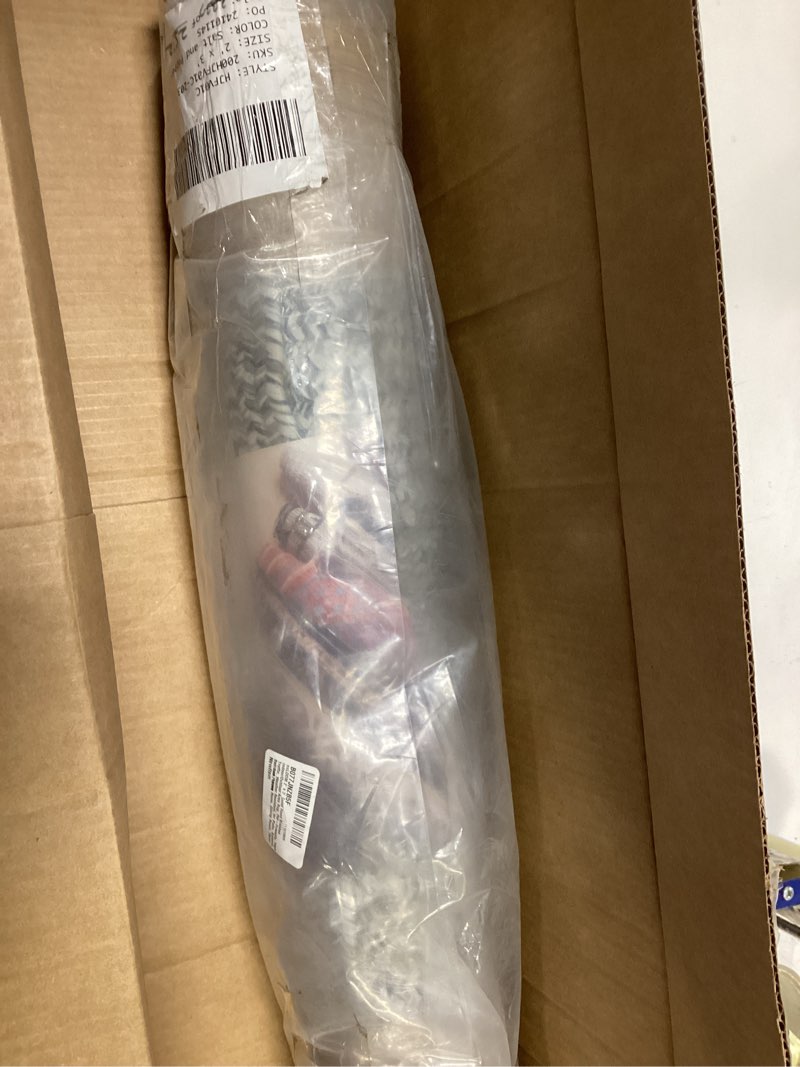 Condition photo showing As Is for nuLOOM 2' x 3' Solid Hand Braided Indoor/Outdoor Area Rug, Pet-Friendly, High Traffic, Weather Resis