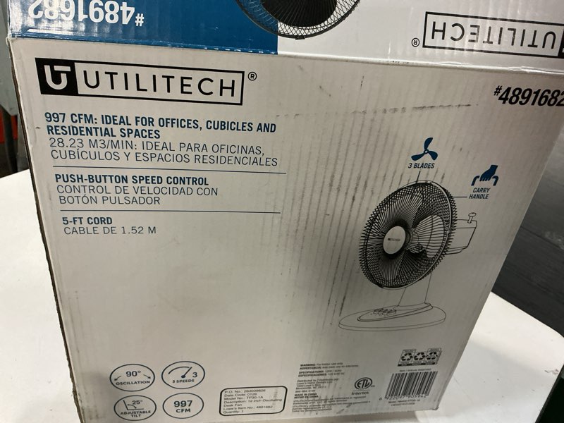 Condition photo showing As Is for utilitech 12-in 120-volt 3-speed indoor black oscillating desk fan