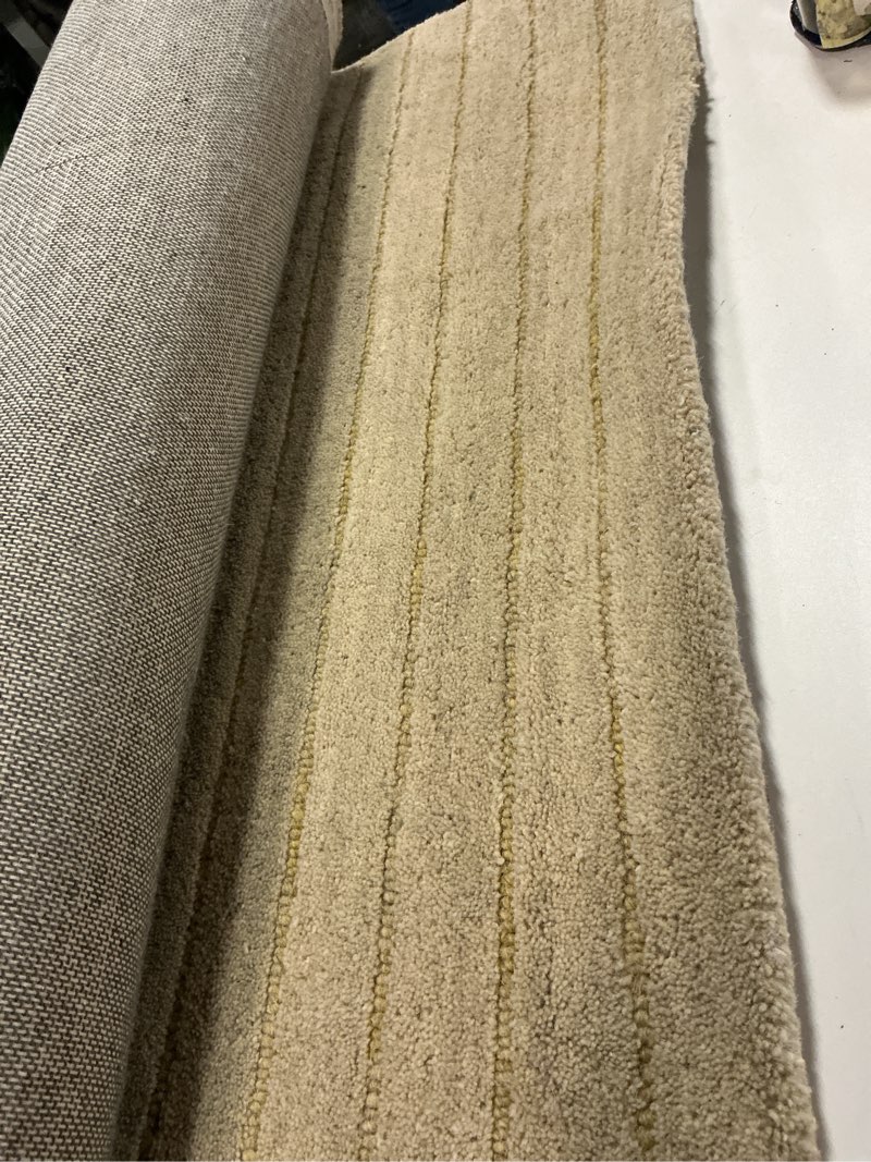 Condition photo showing As Is for Loloi Chris Loves Julia Henry Collection HEY-01 Beige/Wheat 5'-0" x 7'-6", .50" Pile Height, Area Rug Beige / Wheat 5' x 7'6" (Rectangular)