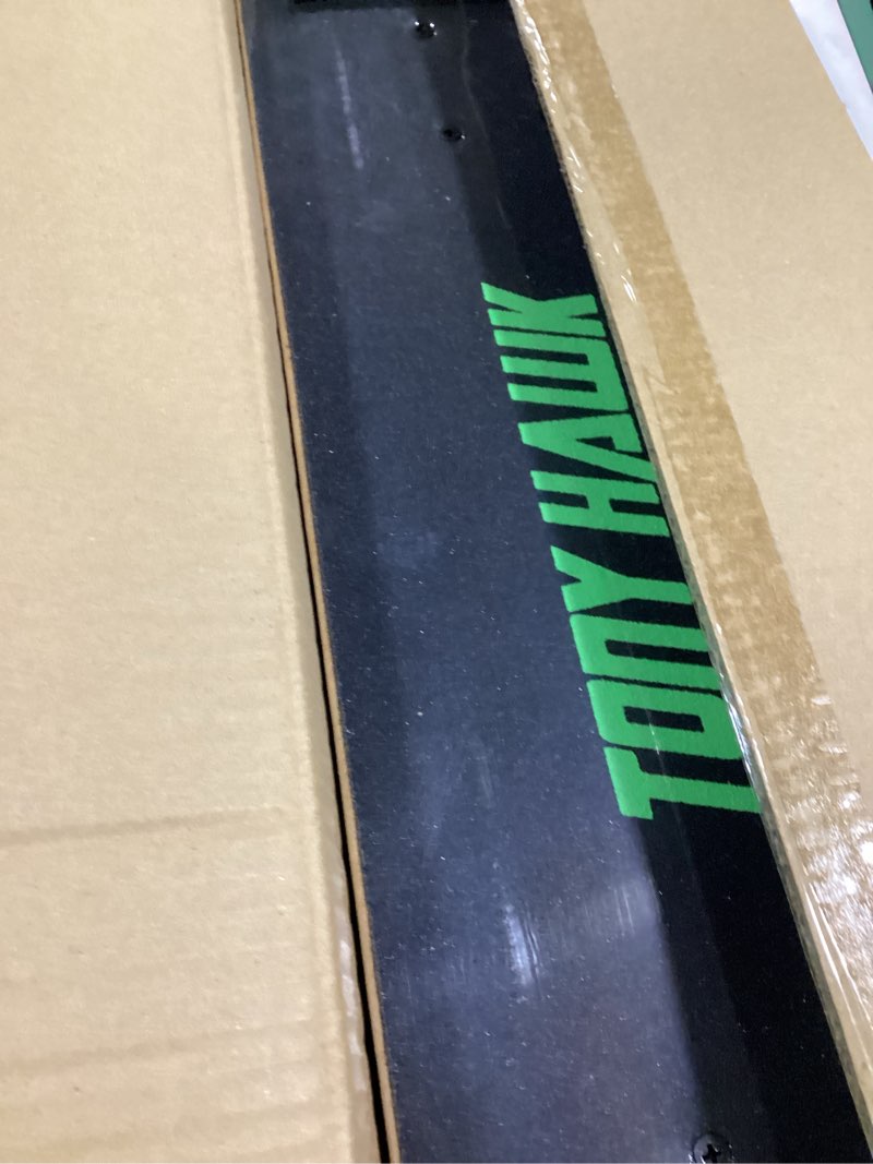 Condition photo showing New/Like New for tony hawk 31" skateboard - signature series 1 skateboard with pro trucks, full grip tape, 9-ply maple deck, ideal for all experience levels