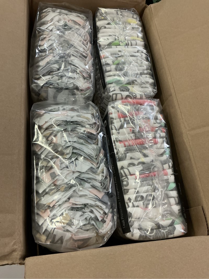 Condition photo showing New/Like New for the honest company comfort dry disposable daytime diapers for sensitive skin, hypoallergenic, big trucks + all the letters, super club box size 5 (27 lbs), 84 count size 5 (84 count) big trucks + all the letters