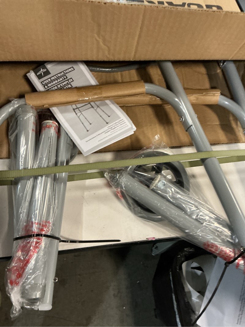 Condition photo showing New/Like New for medline lightweight folding walkers for seniors, adults with 5” wheels, steel frame supports up to 400 lbs.