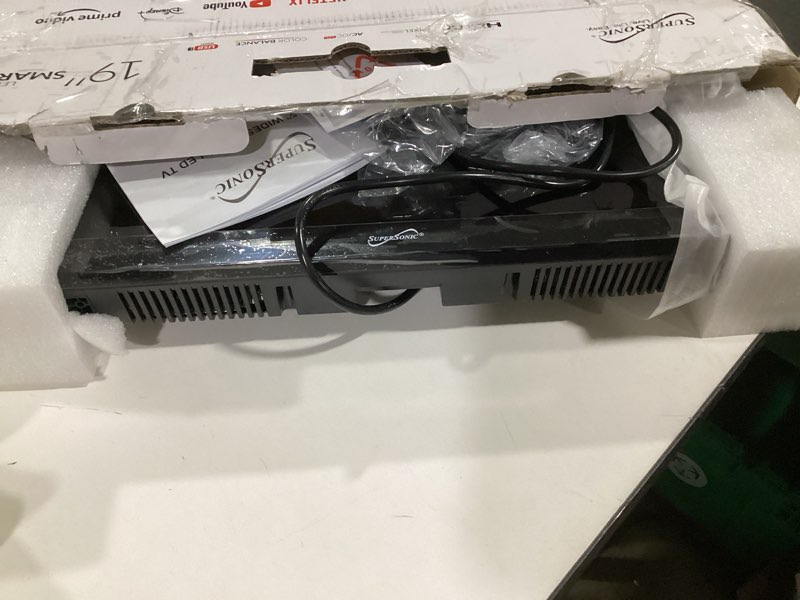 Condition photo showing As Is for Supersonic SC-1920VTV 18.5inch Smart AC/DC LED TV, Powered by VIDAA, 1080p, WiFi, Built-in Speakers, USB, 3X HDMI ARC, for Kitchen, RV, Boat, Truck, Playroom, Dorm Room, Remote, DC Car Cord Included