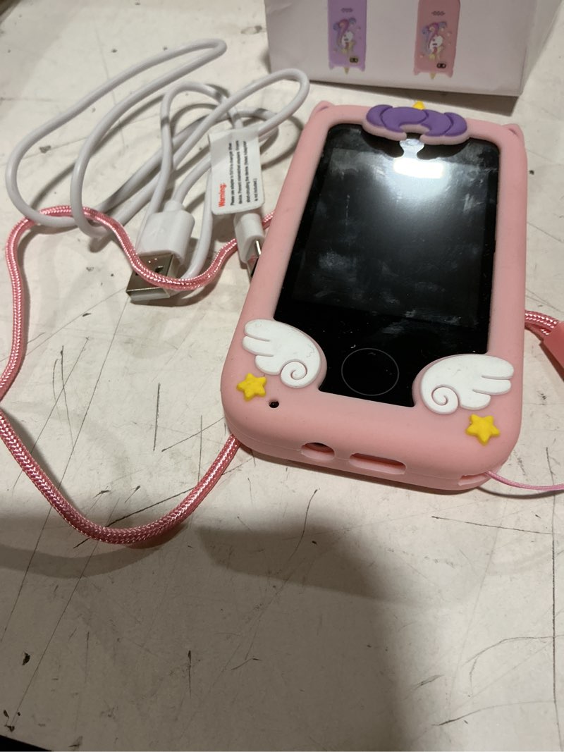 Condition photo showing As Is for ucidci unicorn kids smart phone toys for girls ages 3-7 with dual camera - toddler phone with learning games, travel toys with mp3 music player for christmas, birthday gifts for 3 4 5 6 7 year old pink