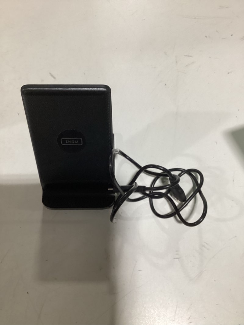 Condition photo showing Good Condition for INIU Wireless Charger, 15W Fast Wireless Charging Station with Sleep-Friendly Adaptive Light Compatible with iPhone 17 16 15 14 13 12 Pro Max Samsung Galaxy S25 S24 S23 Note 20 Google etc Black 1 Pack