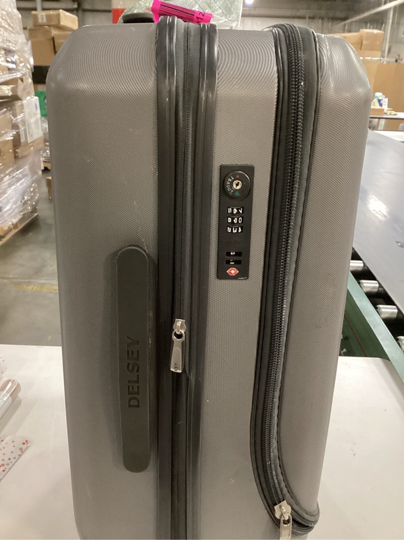 Condition photo showing Good Condition for DELSEY PARIS Titanium Hardside Expandable Luggage with Spinner Wheels Carry-On Luggage, Silver, Carry-On 21 Inch