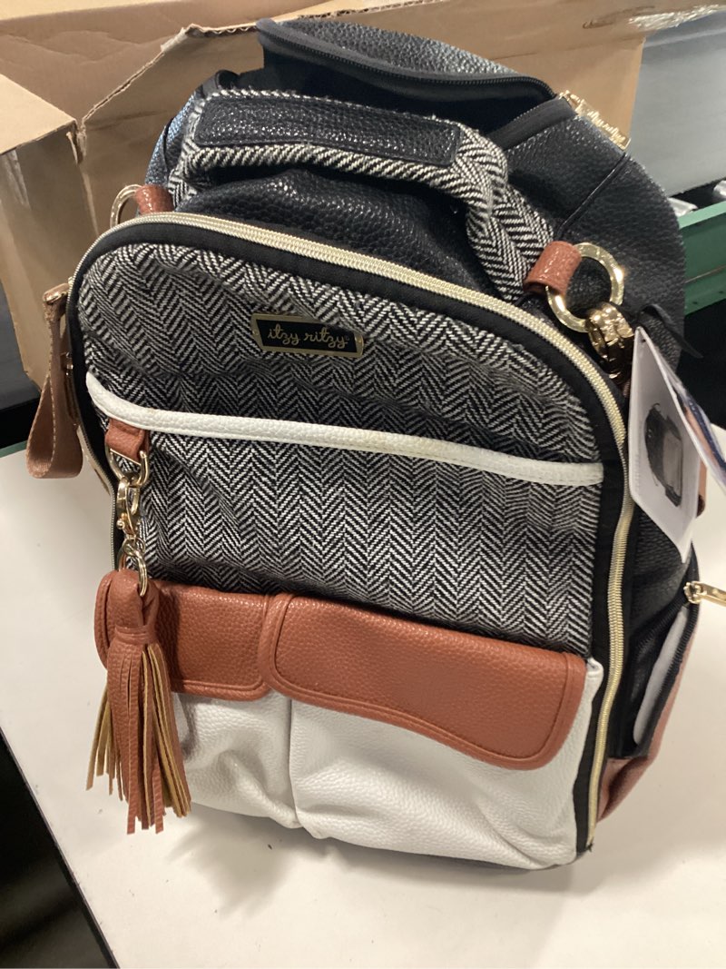 Condition photo showing As Is for Itzy Ritzy Diaper Bag Backpack – Large Capacity Boss Plus Baby Backpack Diaper Bag Featuring 19 Pockets, Changing Pad, Stroller Clips, and Comfortable Straps (Coffee & Cream) Coffee & Cream Boss Plus