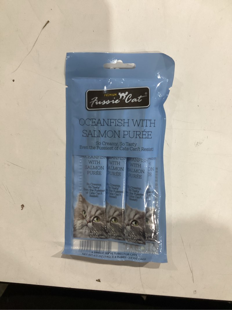 Condition photo showing Good Condition for Fussie Cat Ocean Fish and Salmon Puree, lickable cat Treats, 0.5oz, 4 count Pouch Pack of 1 Small
