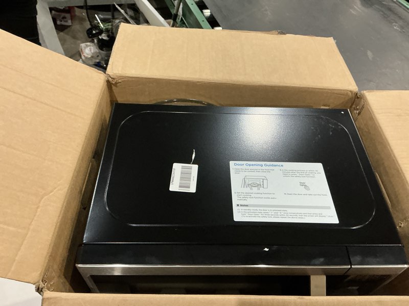 Condition photo showing Good Condition for farberware 0.7 cu. ft. countertop microwave oven – 700 watts power, auto cook settings, defrost, easy clean and child safety lock - stainless 0.7 cu. ft. stainless steel