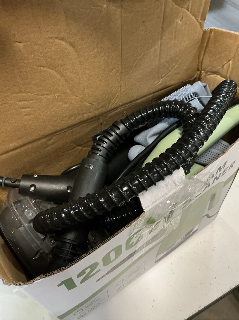 Condition photo showing As Is for handheld steam cleaner, portable steamer for cleaning with 18pcs accessories, 12s fast heating, pressurized steam cleaner for home, kitchen, bathroom, car detailing, window, and clothes, green