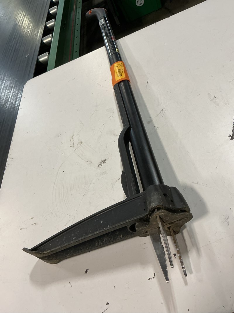 Condition photo showing As Is for fiskars 39.25 in. stainless steel weeder aluminum handle