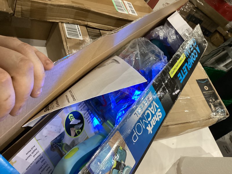 Condition photo showing Good Condition for Shark VACMOP Reveal New Cordless Hard Floor Cleaner, Vacuum & Spray Mop, Powerful Suction, Lightweight, Illumination Light, Includes 4 Disposable Pads, 12oz Pet Multi-Surface Cleaning Solution, VM401 New Vacmop Reveal With 4 Pads