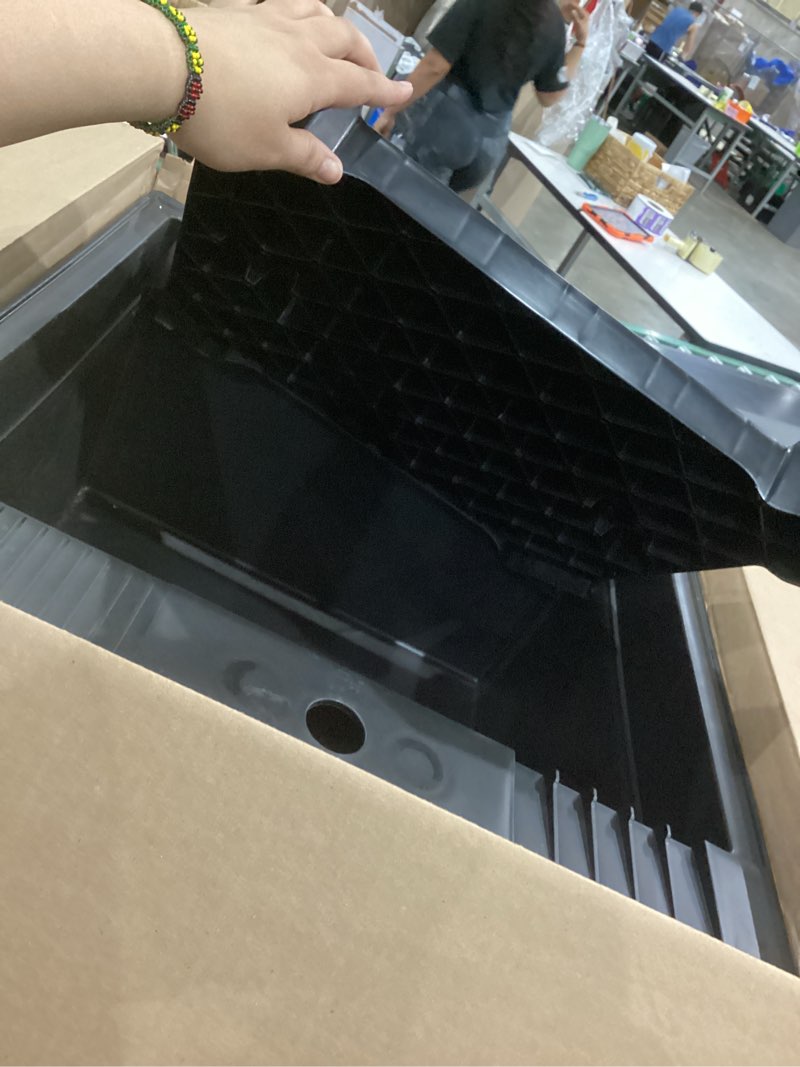 Condition photo showing As Is for project source 24-in x 24-in 1-basin black freestanding utility tub with drain and faucet