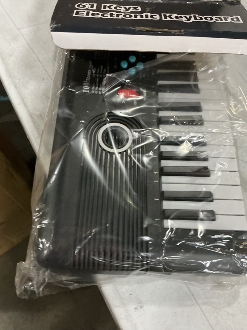 Condition photo showing New/Like New for 61 keys keyboard piano, electronic digital piano with built-in speaker microphone, portable keyboard gift teaching for beginners, electric piano for kids black