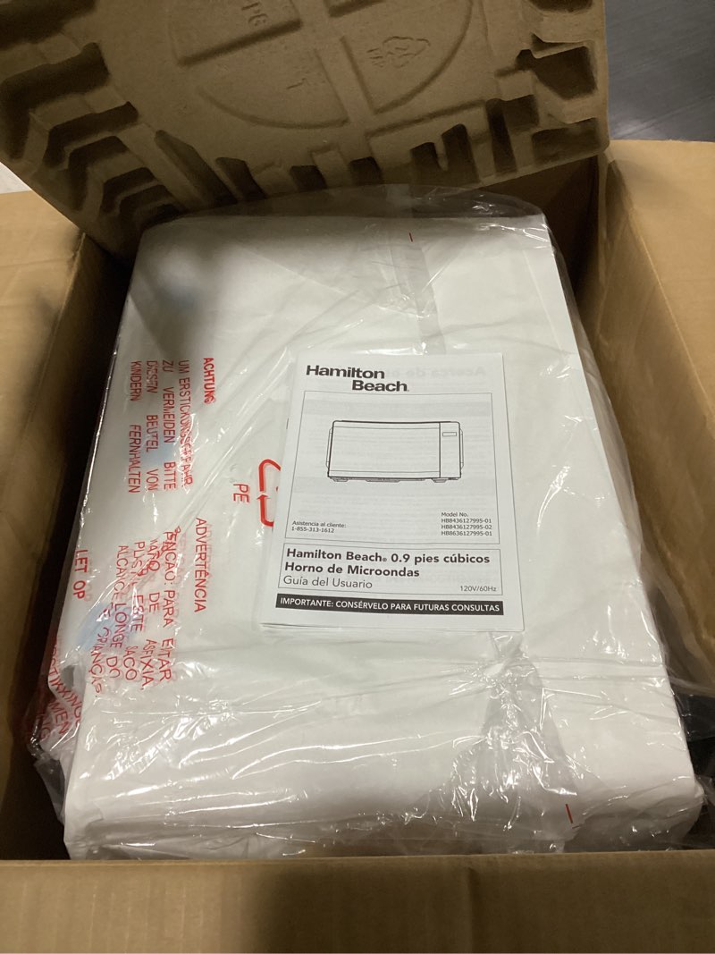 Condition photo showing New/Like New for hamilton beach countertop microwave oven, 0.9 cu ft, 900 w, white stainless steel