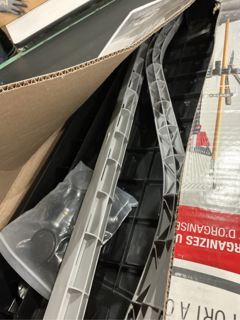 Condition photo showing As Is for rubbermaid garage deluxe tool tower  resin  black