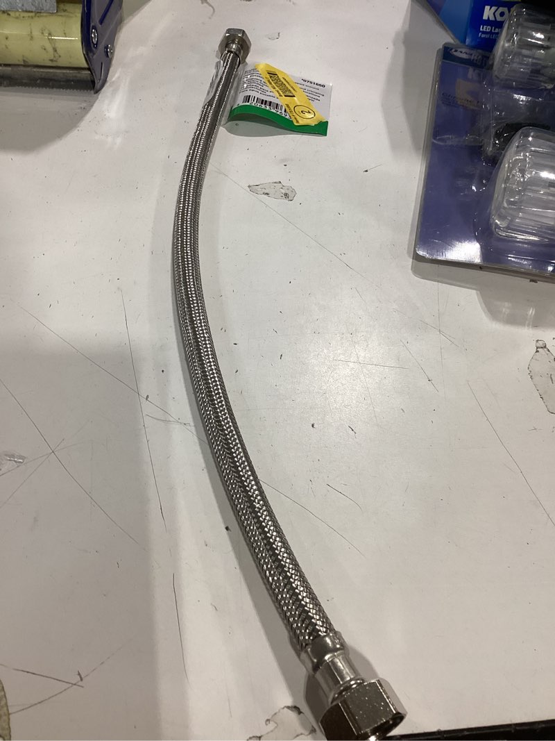Condition photo showing As Is for  reliabilt 1/2-in fip x 1/2-in fip x 20-in braided stainless steel flexible faucet supply line