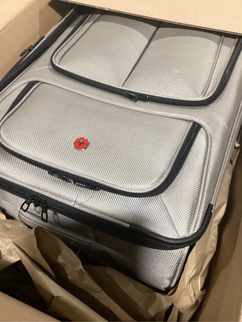 Condition photo showing As Is for SwissGear Sion Softside Expandable Luggage, Pewter, Checked-Large 29-Inch Checked-Large 29-Inch Pewter